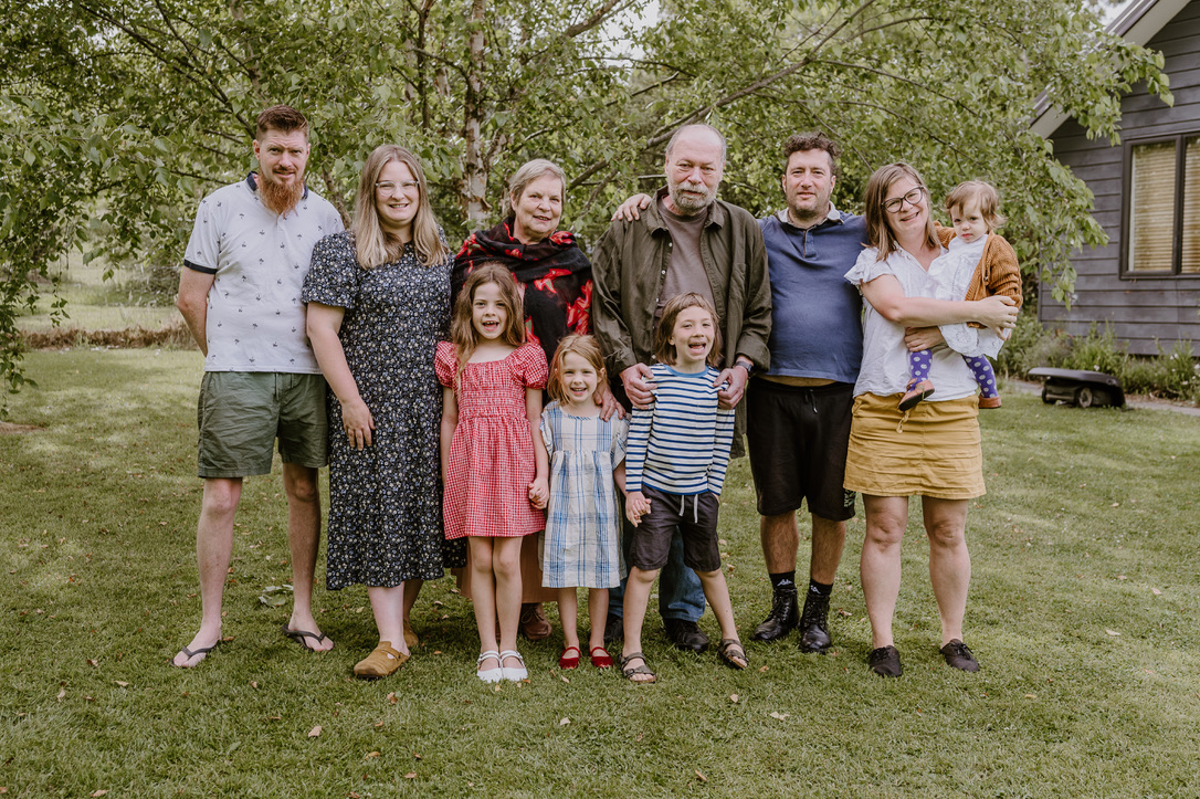 Our family by the house